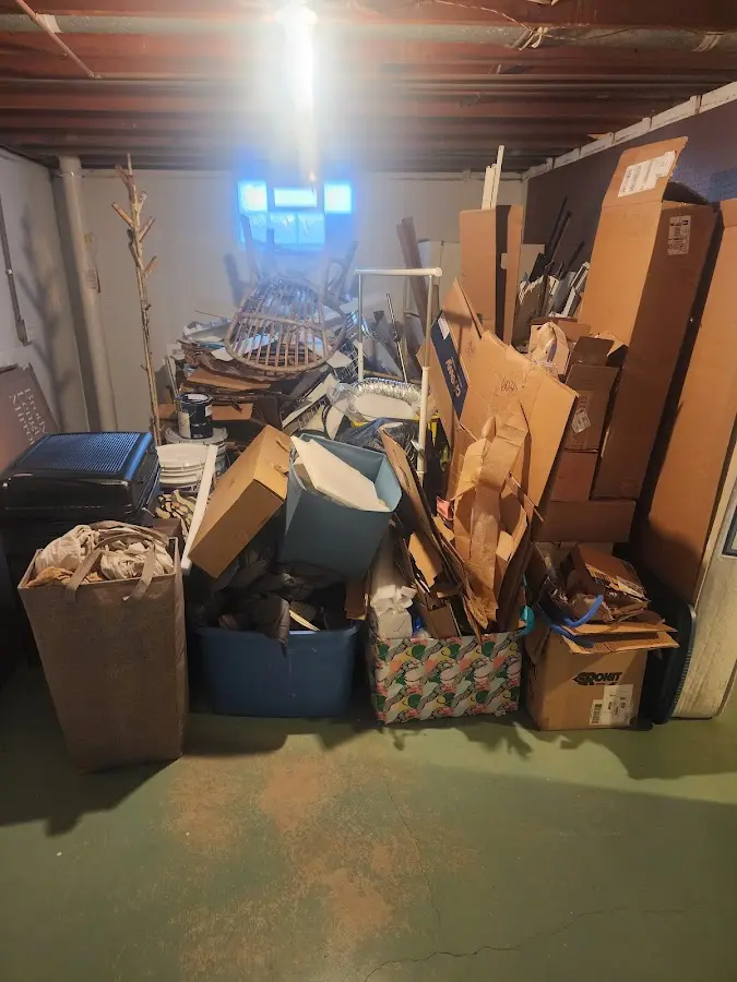 Roll-off dumpster container at job site for Yard Waste Dumpster Rental in Ankeny